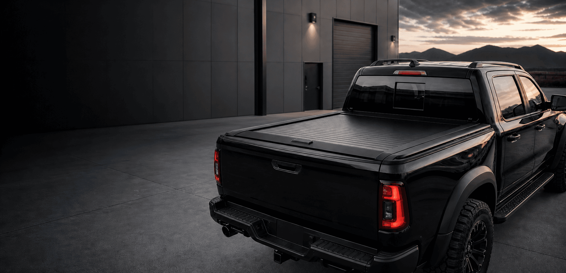 Black pickup fitted with a retractable bed cover