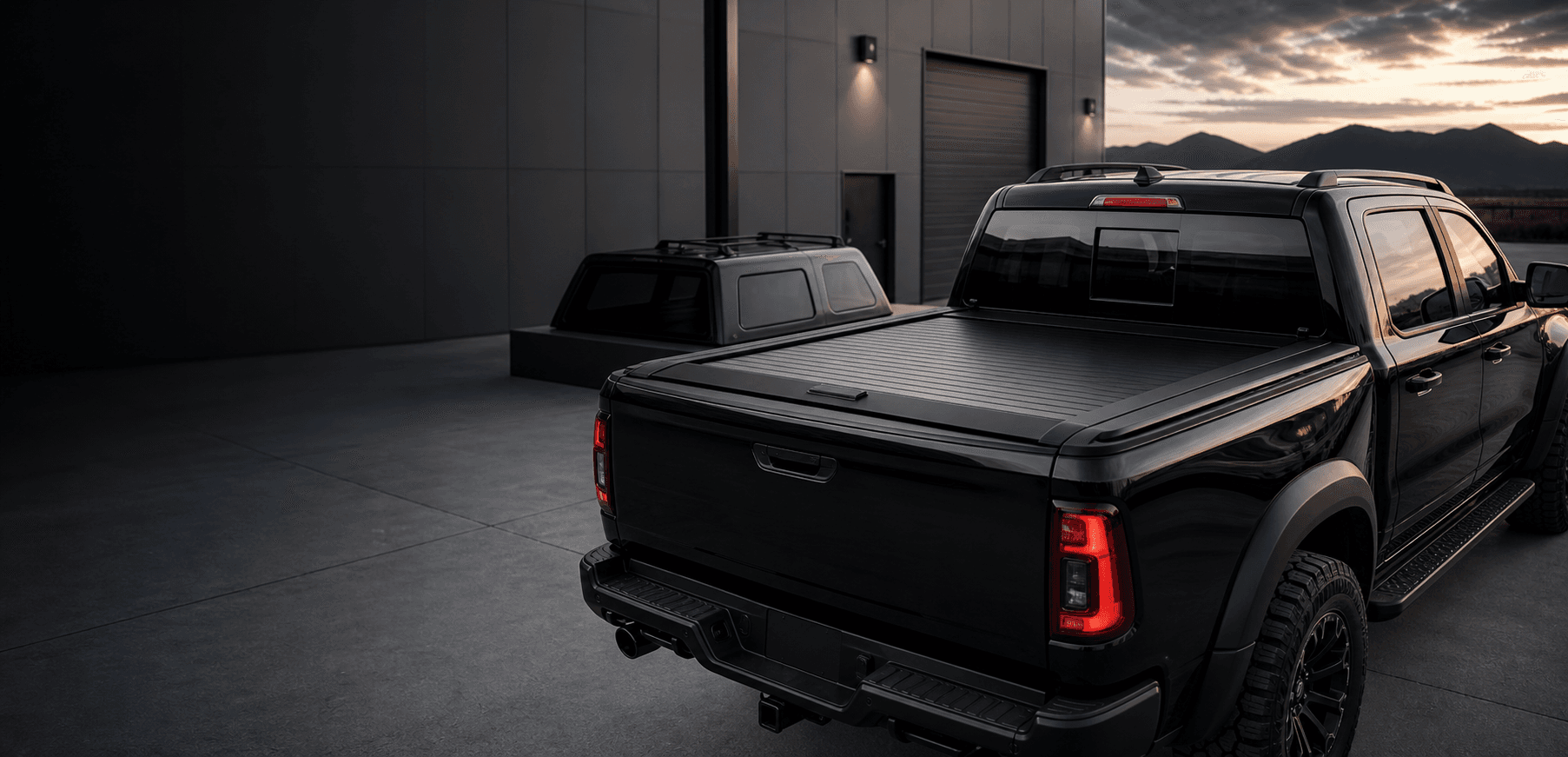 Black pickup fitted with a retractable bed cover